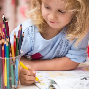 Girl Coloring On A Page